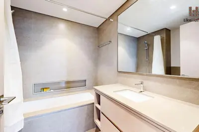 a bathroom with a sink and a mirror at NEXT TO BURJ AND DUBAI MALL 2 BR BEST LOCATION in Dubai