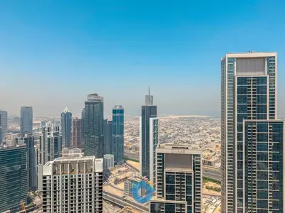 an aerial view of a city with tall buildings at BEST SEA VIEW NEXT TO BURJ KHALIFA AND DUBAI MALL in Dubai