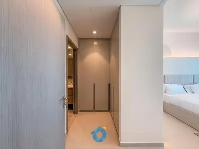 an open door to a bedroom with a bed at Direct Burj Khalifa View Near Dubai Mall Like Home in Dubai