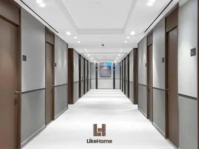 an empty corridor in a building with doors and ceilings at BEST VIEW IN DUBAI BURJ KHALIFA VIEW in Dubai