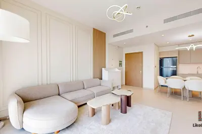 a living room with a couch and a table at BEST VIEW IN DUBAI BURJ KHALIFA VIEW in Dubai