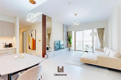 a living room with a couch and a table at NEXT TO BURJ KHALIFA AND DUBAI MALL ONLY 2 MINUTES AWAY in Dubai
