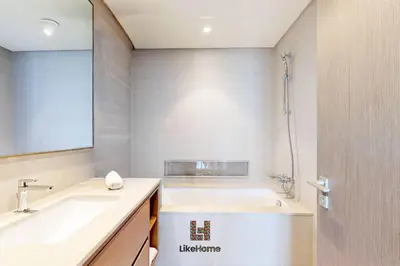 a bathroom with a tub and a sink at LUXURY AND BEST LOCATION 2 MINUTES BURJ KHALIFA in Dubai