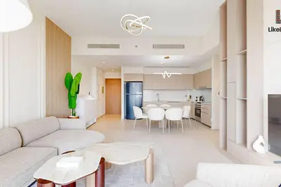 a living room with a couch and a table at LUXURY AND BEST LOCATION 2 MINUTES BURJ KHALIFA in Dubai