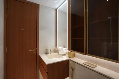 a bathroom with a sink and a mirror at Spacious 2BR Near Beach Ellington in Dubai