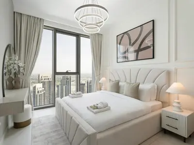 a white bedroom with a large bed and large windows at The Grand Majestic Sky Luxe 1BR Sleeps 4 06 in Dubai