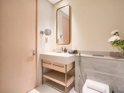 a bathroom with a sink and a mirror at Vida Residences 2BR-Direct Dubai Mall Access in Dubai