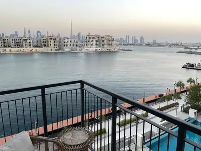 a view of a body of water from a balcony at La Mer Iconic View 1 bedroom in Dubai