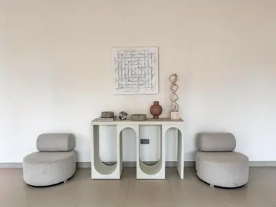 a white table and two chairs in a room at PVH - Contemporary 1BR Near Burj Khalifa - Forte Tower 2 in Dubai