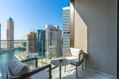 a balcony with a view of a city skyline at Luxury 1Bed with Canal Views Near Burj Khalifa in Dubai