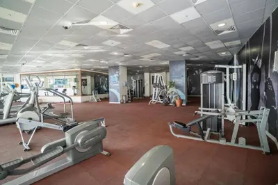 a gym with treadmills and ellipticals in a room at Vacationer l Cozy 1 Bed l Partial Sea View l Prime Location in Dubai