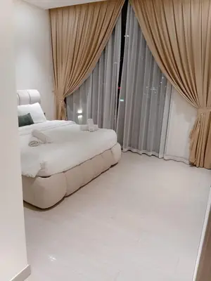 a bedroom with a bed and a large window at The Executive Suite Luxury 1 Bedroom Brand New in Dubai