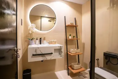 a bathroom with a sink and a mirror at Airstay - Upgraded Studio - Near Pool & Metro - Monthly Offer Available! in Dubai