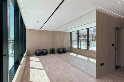 a room with a row of black spheres on the floor at GuestReady- Comfortable 1 bedroom- High Floor in Dubai