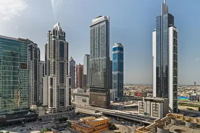 a view of a city with tall buildings at Stylish 1BR, Walk to Burj Khalifa and Dubai Mall in Dubai
