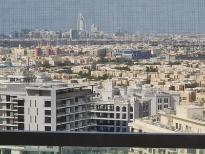 a view of a city from the top of a building at Fully Equipped Home near Miracle & Butterfly Gardens in Dubai