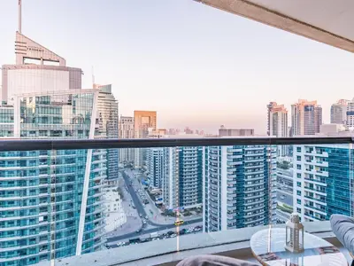 a view of the city from the balcony of a building at Waterfront 1BR- Time Place Dubai Marina-City Views in Dubai