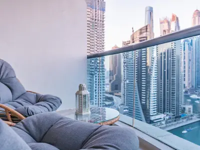 a room with a view of a city skyline at Waterfront 1BR- Time Place Dubai Marina-City Views in Dubai