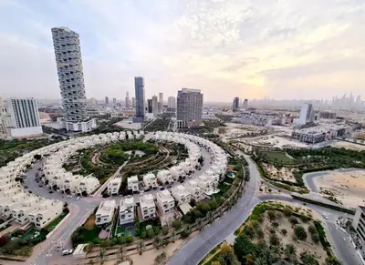 an aerial view of a large circular park in a city at Ruby home in Dubai