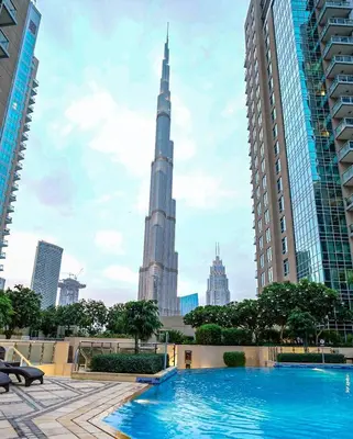 a view of the burj khalifa from the rooftop of a building at Elite Royal Apartment - Sky Series - Panoramic New Fountain & Burj Khalifa View - Nebuchadnezzar II in Dubai