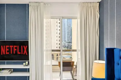 a hotel room with a view of a city at Ahlan Marhaba Marina JBR in Dubai