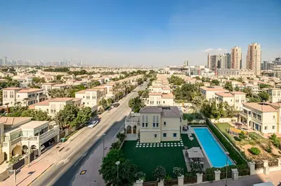 an aerial view of a city with buildings at Apartment-Private Bathroom in Dubai