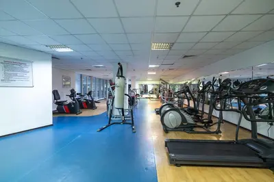 a gym with treadmills and elliptical machines at StayShort - Majestic 4BR in Dubai Marina - Sleeps 8 in Dubai