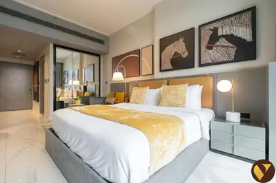 a large bedroom with a large bed in a room at Vogue Downtown Mag 318 near Burj Khalifa and Dubai Mall, Studio Apartment with Balcony, Canal and City Skyline View, Access to all Amenities in Dubai