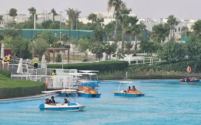 three boats in a river with people on them at 3-Bedroom Cozy Townhouse with great amenities in Dubai in Dubai