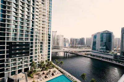 a view of a river in a city with tall buildings at Luxury Studio at PRIVE by DAMAC - Canal Views in Dubai