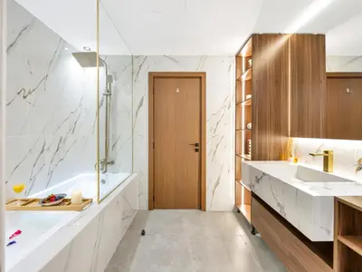 a bathroom with a tub and a sink at 4 BHK JBR BEACHFRONT# Next to Dubai Eye# Marina View in Dubai