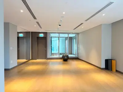 a large empty room with a ball on the floor at Urban Luxury Burj Vista Apartments Direct Burj Khalifa View in Dubai