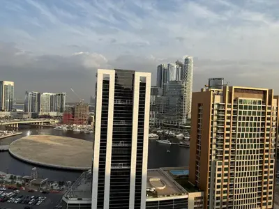 a view of a city skyline with tall buildings at MAG 318 Luxury Studio Resort Style Amenities in Dubai