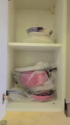 a refrigerator filled with lots of plastic bags at Luxury Studio in the Heart of Meydan in Dubai