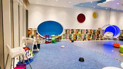 a room with many different types of play equipment at High-Floor 3BR with Balcony Overlooking the Marina, Near the Beach, Just Minutes Walk to the Tram, Damac Heights, Dubai Marina by Deluxe Holiday Homes in Dubai