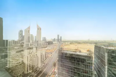 a view of a city from the top of a skyscraper at Silkhaus 2BDR Heart of DIFC in Sky Gardens in Dubai