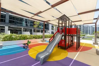 a playground with a slide in a building at Luxury Studio with Burj Khalifa View in Dubai