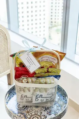 a basket filled with food on a table at Airstay - Full Marina Views - Coastal Studio - Monthly Offer Available! in Dubai