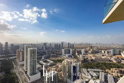 an aerial view of a city with tall buildings at LUX The Phantom Sky Pool Suite in Dubai