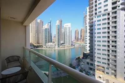a view of a river from a balcony of a building at Bright 2BR in Dubai Marina - Close to beach in Dubai