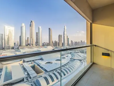 a balcony with a view of a city at Direct Dubai Mall Access-Emaar Residences-1BR Like Home in Dubai