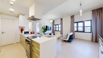 a kitchen with a sink and a counter at Vacationer l Cozy 1 Bed l Jumeirah Golf Estate l Free Pool, Gym in Dubai
