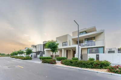 an empty street in front of a apartment building at Vacationer l Breathtaking 5 Bed Villa l Luxurious & Spacious in Dubai