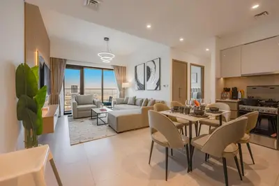 a living room with a couch and a table at Luxury 2 bed, 5 mins walk to Dubai Mall and Burj Khalifa in Dubai