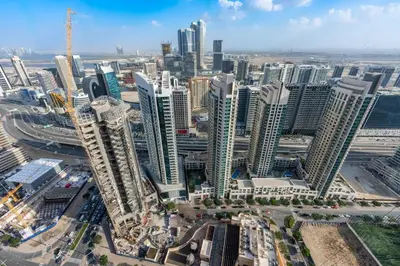 an aerial view of a city with tall buildings at Luxury 2 bed, 5 mins walk to Dubai Mall and Burj Khalifa in Dubai