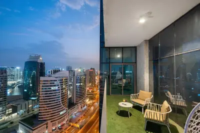 a view of a city skyline from a building at Luxury 2BR in Mada Residences - Walk to Dubai Mall in Dubai
