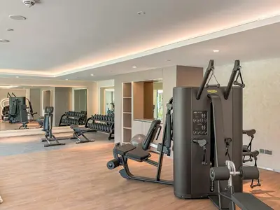 a gym with treadmills and exercise equipment in a building at Silkhaus Luxury New Tower in City Walk in Dubai