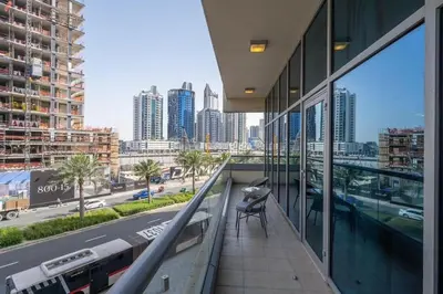 a balcony of a building with a view of a city at Urban apartment near to Dubai mall & Burj Khalifa in Dubai