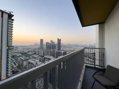 a balcony with a view of a city at Werova-Cozy 2-Bedroom Apartment w Stunning Views in Dubai