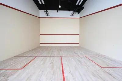 an empty room with a basketball court at Brand New 1B with Burj Khalifa View in Business Bay in Dubai